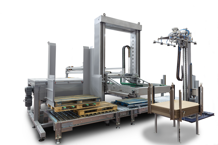 The Dynamic layer palletizer has a double-column structure. A conveyor system runs through its center.